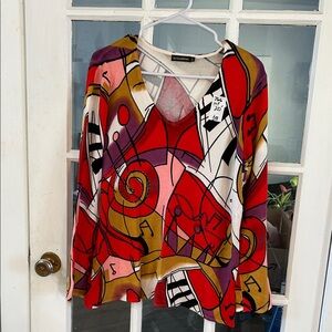 766.   Colorful Geometric V-Neck Top